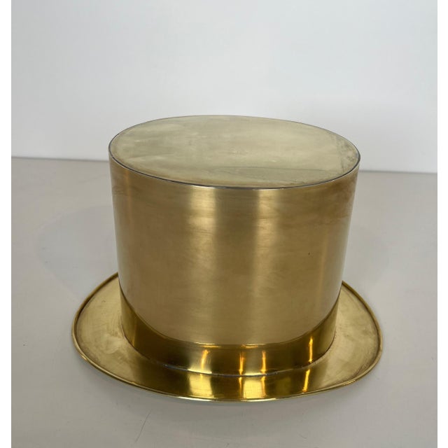 This very beautiful and unusual top hat champagne cooler is made entirely of brass. It is a French work. Circa 1920