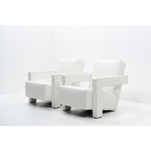 A set of two Utrecht armchairs by one of the founders of the 1920s “De Stijl” movement, Gerrit Rietveld. This sculptural...
