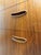 This is a beautiful, high-quality Danish teak chest from the 1960s. It features a stylish curved front, clean edges, and...