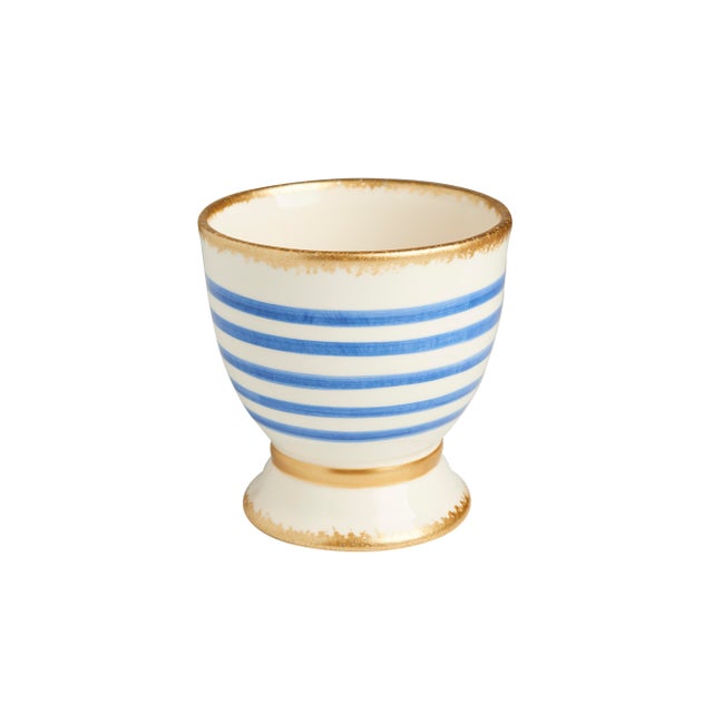 Handmade in Portugal, this cachepot is decorated with a striped pattern. Available in black, green, or blue (with gold...