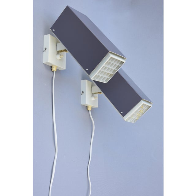 Designed by preben dahl and produced by h.f. Belysning, denmark, during the 1960s, this rare pair of wall lamps...