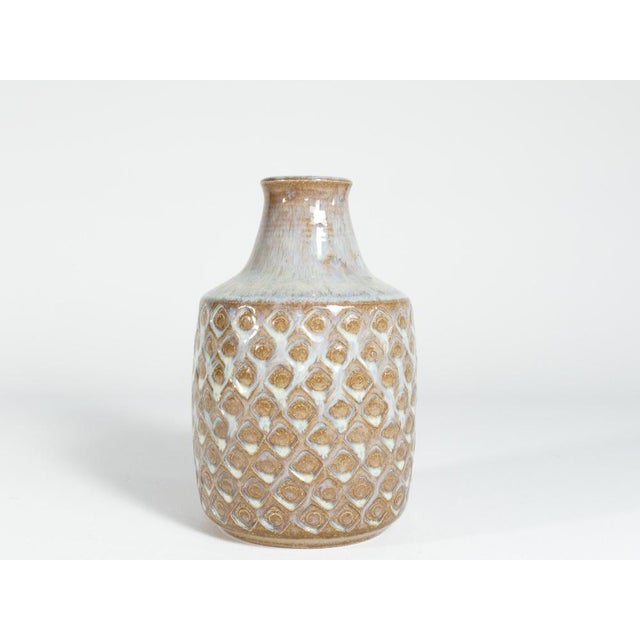 Handcrafted in the mid-20th century, this exquisite stoneware vase bear the distinctive mark of Søholm Stentøj. Produced...