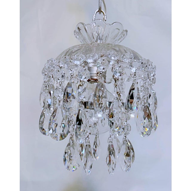 Dome layered chandelier with cut glass dish, octagon chain and 30% leaded swedish cuts crystal drops. It rewired and it...