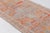 This is a vintage Turkish Oushak rug from the Mid 20th Century. The piece was hand-knotted.