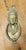 A Victorian Brass Caryatid Door Knocker A Large Victorian Brass door knocker decorated with the face of a caryatid wearing...