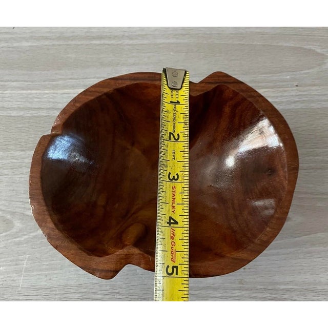 Hand-carved decorative bowl made from richly figured granadillo wood and sourced from Belize. This sculptural artisan...