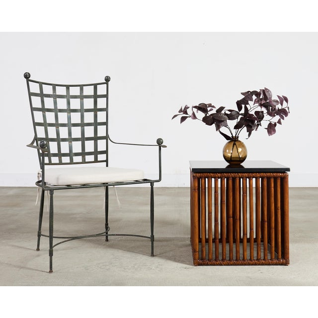 Sleek pair of vintage McGuire San Francisco bamboo cube shaped side, end, or drink tables featuring smooth black granite...