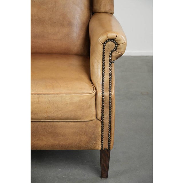 Light Cowhide Wing Armchair with a Timeless English Look and Good Seating Comfort For Sale - Image 10 of 14