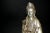 A large 7.15 lb Republic era silver bronze statue of the Goddess of Compassion Guan Yin. Seated on lotus throne,...