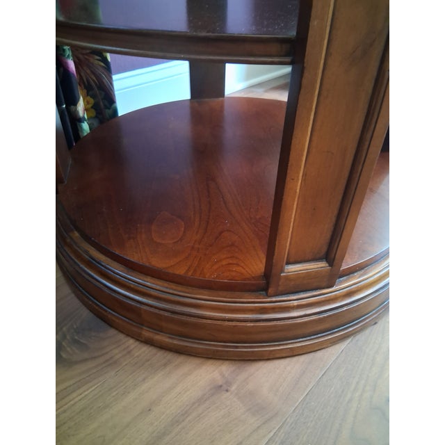 A refined example of classic American furniture design, this Vintage Ethan Allen Townhouse Library Table brings timeless...