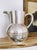A stunning antique circa late 1800s silver plated water pitcher made by Tiffany & Co! In amazing condition for its age,...