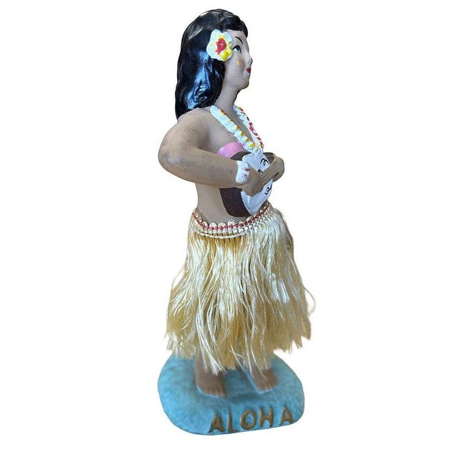 Original post-war ceramic chalk-ware dancing Hawaiian Hula girl figurine made from lightweight plaster and painted in...