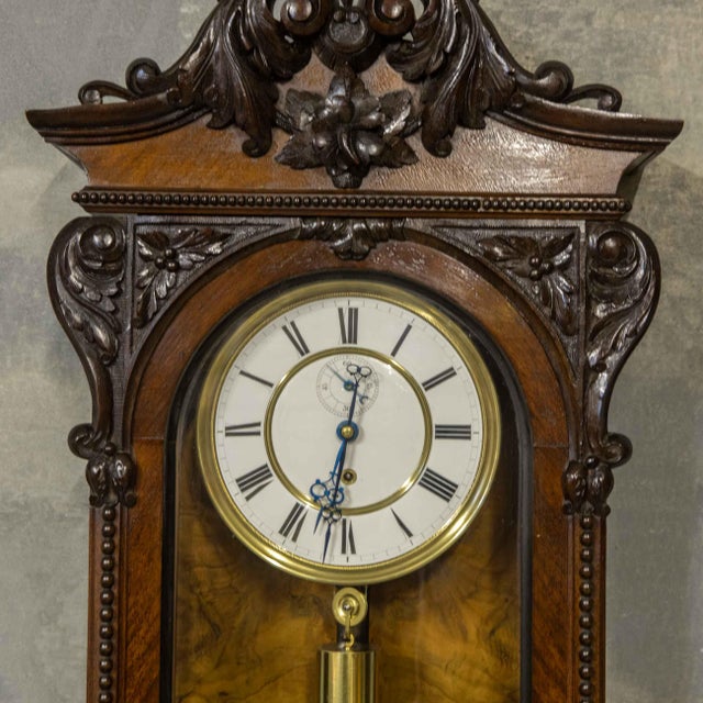 A very attractive walnut cased Vienna wall clock from the late 19th Century. The single weight movement has been totally...