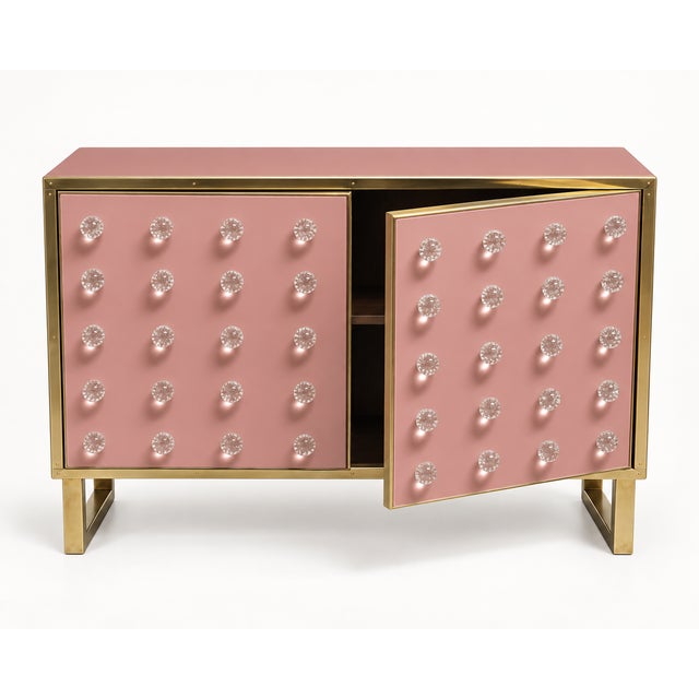 A muted dusty-rose cabinet finish brings warmth to this architectural Italian dry bar. Its two doors carry forty clear...