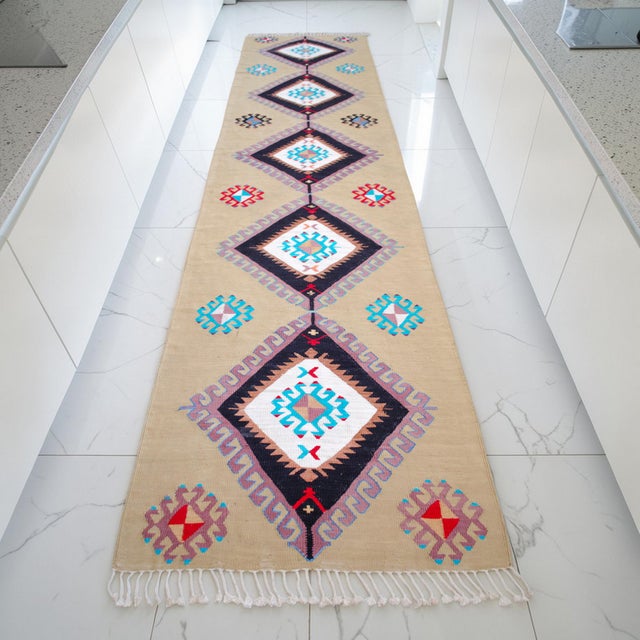 This exceptional silk-on-silk runner, originating from the Aegean region of Turkey, showcases a contemporary...