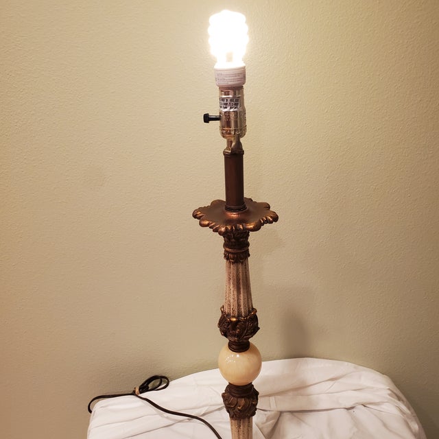 Hollywood Regency style, popular in the 1930s through the 1950s, is characterized by its glamorous and opulent aesthetic,...