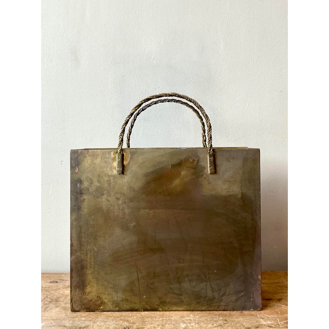 This clever and highly stylish vintage metal vessel is designed as a sculptural trompe l'oeil of a folded shopping bag, a...