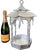A sculptural pagoda lantern in substantial cast aluminum, distinguished by a two-tier roof, upswept eaves, and small...