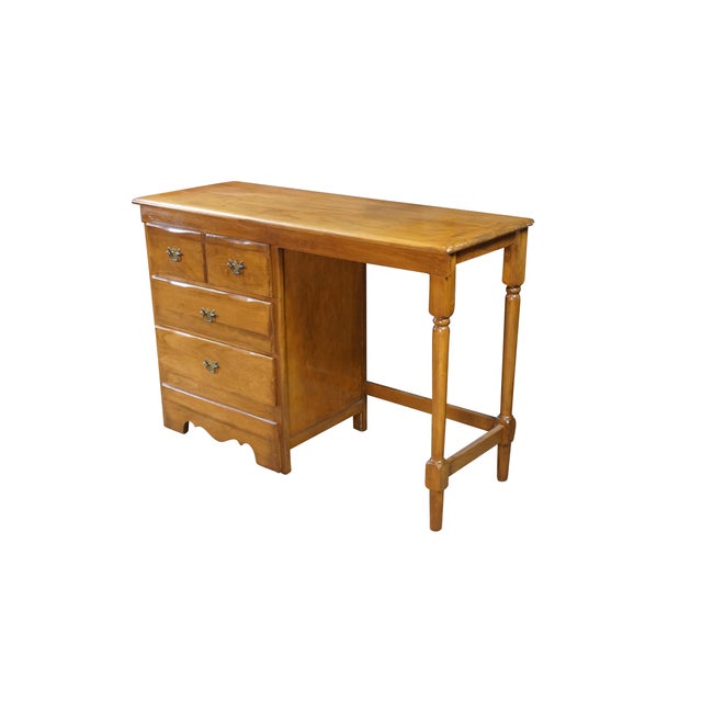This vintage solid maple writing desk features an Early American Colonial design in a warm honey-amber finish. The...