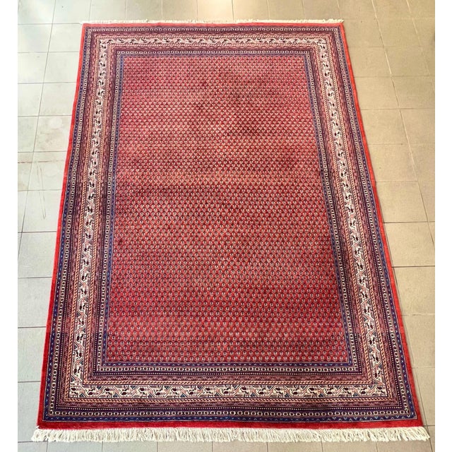 Beautifully preserved vintage oversized Sarouk Mir Persian wool rug. Featuring an overall boteh design with no medallion....