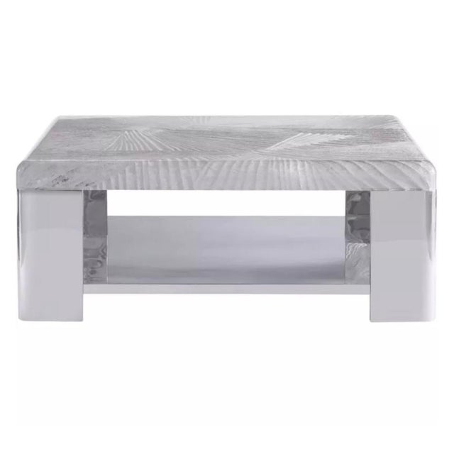 With the cool look of exquisitely sculpted ice, this accent table showcases an acrylic top that is intricately carved with...