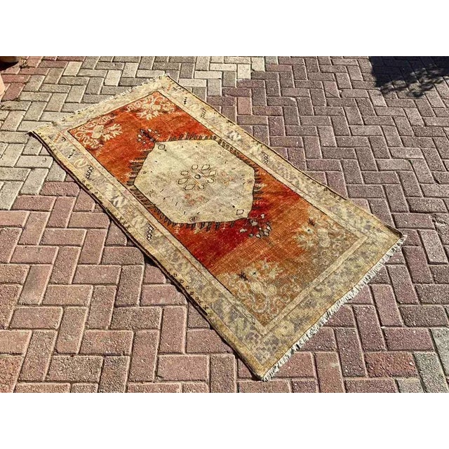 This gorgeous hand knotted area rug was made in 1960's by Anatolian tribals. Collectible rug is made with all hand spun...