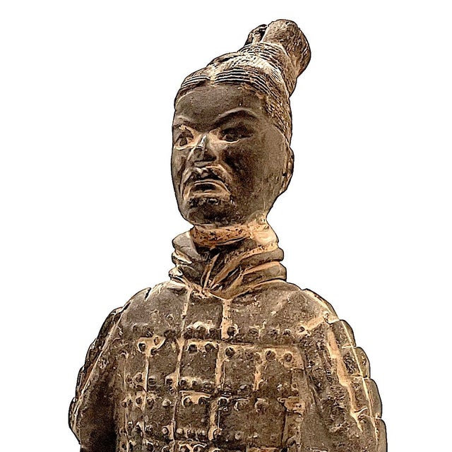 Three piece set of Chinese terracotta warriors. Replica of ancient figures found by archeologists in tomb excavations....