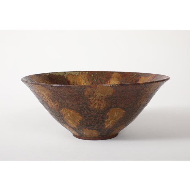 1950's mid-century modern studio made brown mottled decorative bowl, in vintage original condition, with minor wear and...