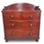 A sweet Victorian English country chest of drawers with lovely details including original wooden drawer pulls and round...