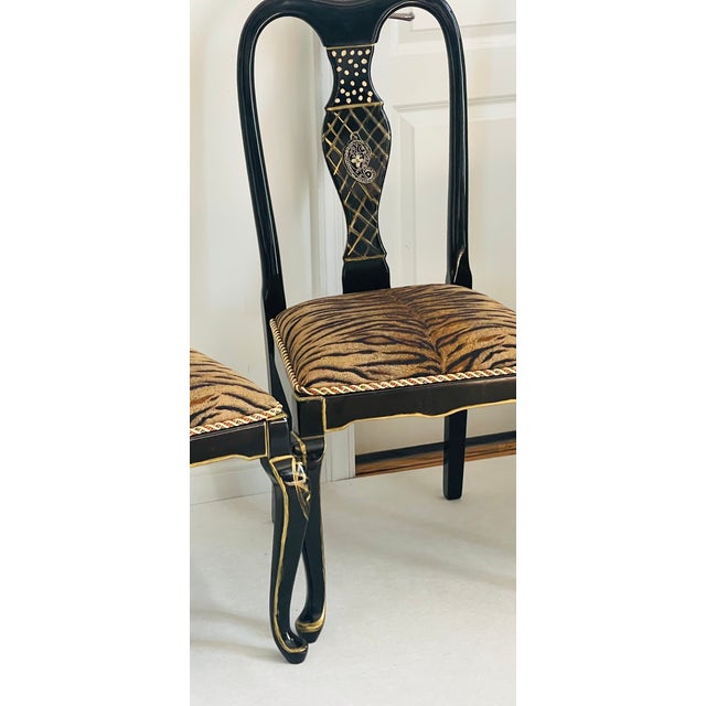 Gorgeous set of 4 high back lacquer side or dining chairs with tiger brocade upholstery. Mid 20 th century