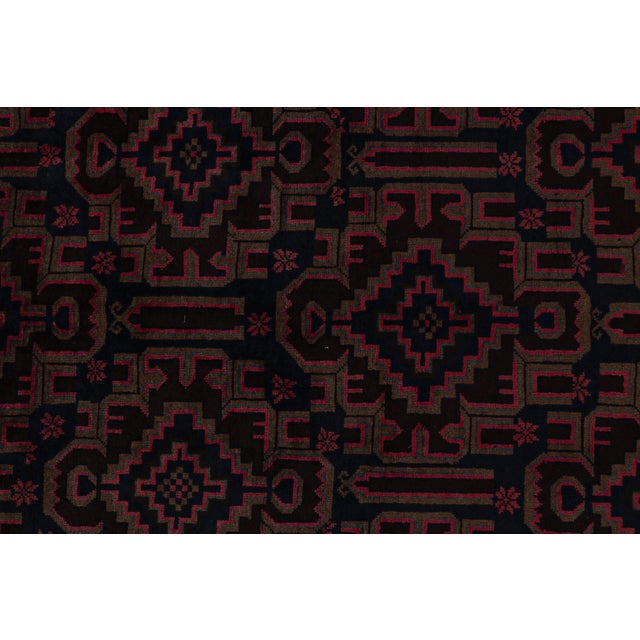 Hand knotted in wool, this 6x9 Baluch rug represents a new line of tribal carpets in the Modern Classics Collection by Rug...