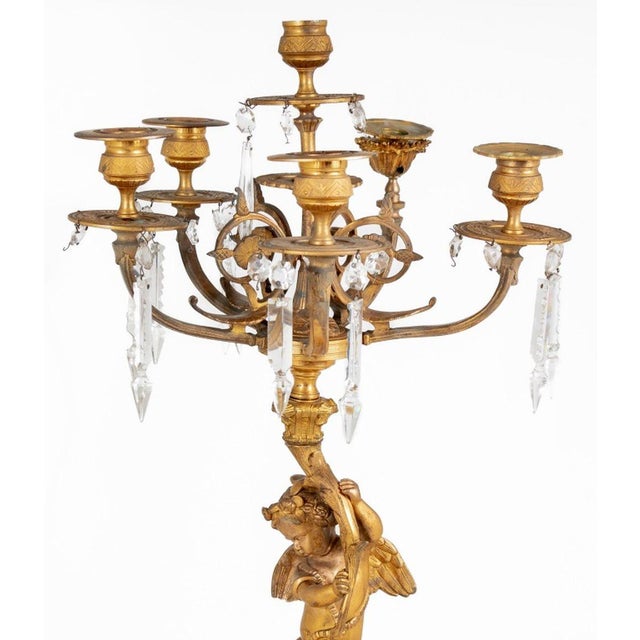 Louis XV Style Gilt Bronze Cupid Six Branch Candelabrum, late 19th century, the figure upholding a cornucopia issuing five...