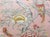 Custom-tailored pillow by Mike Seratt of The Prized Pig in Thibaut's "Giselle" botanical, bird, and butterfly linen print...