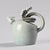 Zoomorphic jug made by Suzanne Ramié for the Madoura workshop around 1945. Made of celadon green glazed ceramic with a...