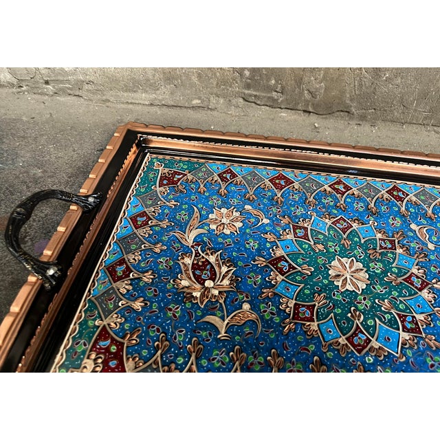 Floral hand carved tray with handles made by copper. Etched design and perfect for serving. Great for displaying your...