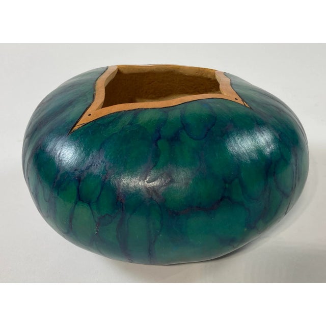 Unique artwork made from a dried gourd. Drizzle abstract applique with a star cut out to top trimmed in gold paint. Signed...