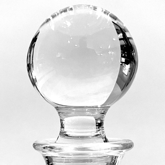 Modern and elegant mid-century modern lead crystal decanter. Body features a charming "dot" grid pattern. Solid round fall...
