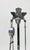 Art Deco chrome fireplace tool set, circa 1925-1935. Two matching stands with the full suite of tools (poker, brush,...