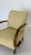 Comfortable club chair with curved armrests made of dark-stained oak. Simple and stylish, the understated design blends...