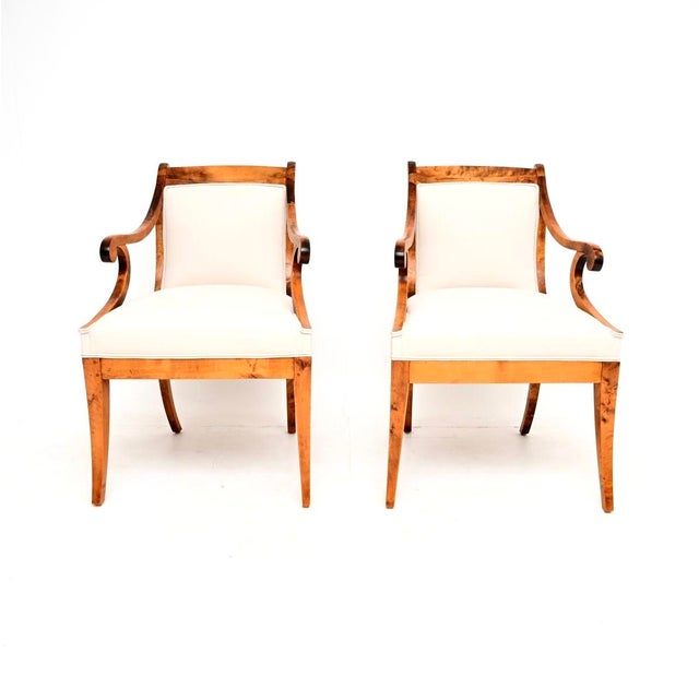 A stunning pair of antique Swedish satin birch Biedermeier armchairs. They were recently imported from Sweden, and they...