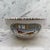 English ceramic bowl by Adams, decorated in the Old English Sport pattern with two game birds titled “Set To.” The central...