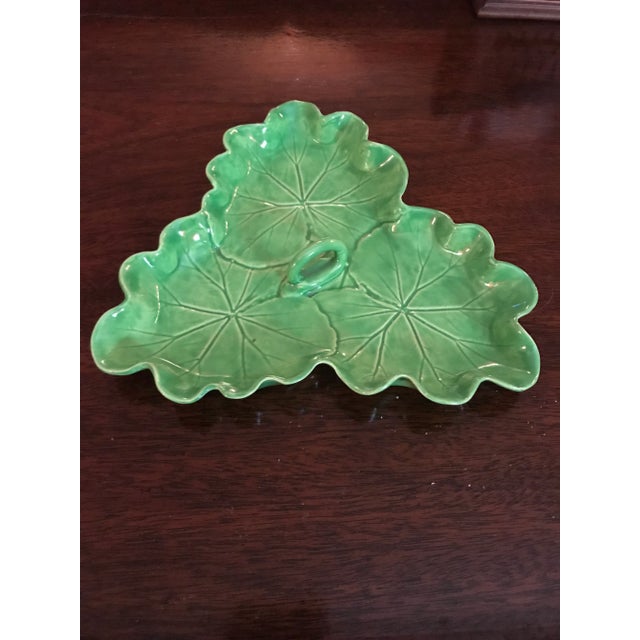 This is a wonderful vintage piece of pottery by Pat Young. The trefoil dish is in the shape of three lily pads joined to...
