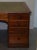 Victorian 4-Sided Pedestal Desk in Flamed Hardwood & Green Leather For Sale - Image 17 of 18