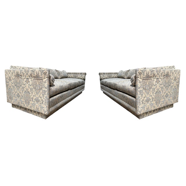 A pair of matching 91" mid-century modern tuxedo sofas in the style of Milo Baughman for Thayer Coggin, estimated circa...