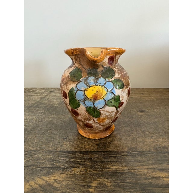 This piece is a mid-century vintage Italian Majolica pottery pitcher, which was most likely produced between the 1950s and...