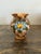 This piece is a mid-century vintage Italian Majolica pottery pitcher, which was most likely produced between the 1950s and...