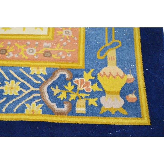 Hand-knotted with care using traditional rug-making techniques, this wool rug blends timeless craftsmanship with a modern...