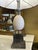 Pair of egg-shaped table lamps in veined marble, mounted on a brushed silver-plated cubic base, with matching shades and...