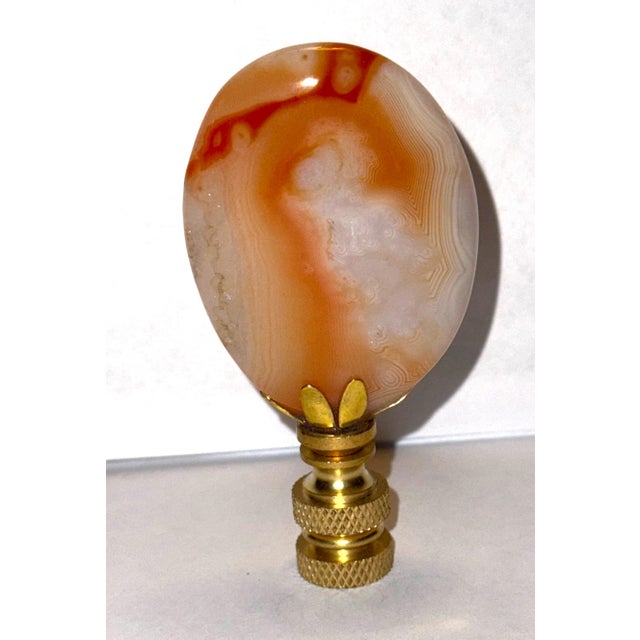 Add a bit of glamor to your lamp with this gorgeous carnelian palmstone finial Natural stone secured with epoxy resin to a...