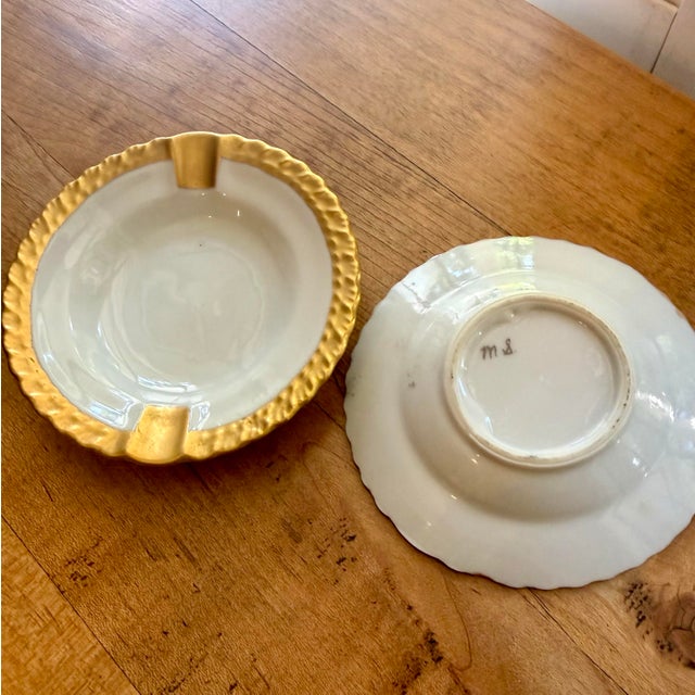Pair of Mid Century, hand painted ashtrays in mint condition, Characterized by a heavy ruffled or "ripple" edge finished...